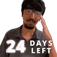 a man wearing glasses and a shirt that says " 24 days left "