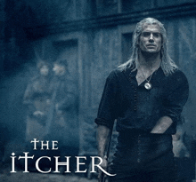 a poster for the witcher with a man holding a sword