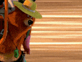 a cartoon bear wearing a yellow hat and a badge that says ' ranger '