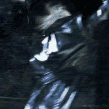 a blurry picture of a person 's face with the words johnny depp gifs at the bottom .