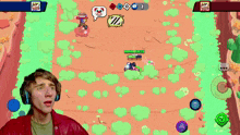 a man wearing headphones is playing a video game with novafacto