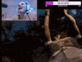 a woman wearing headphones is hanging upside down in front of a screen that says ' 106 21.20% '
