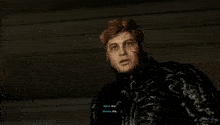 a man in a spiderman suit stands next to a woman in a yellow sweater and says " venom are "