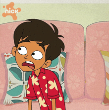 a cartoon of a boy sitting on a couch with a nick logo in the background