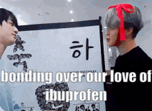 two men are standing next to each other with the words bonding over our love of ibuprofen on the bottom
