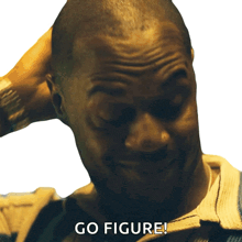 a man scratching his head with the words go figure below him