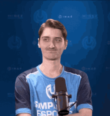 a man in a blue shirt that says simply esport