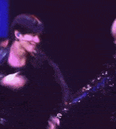 a blurry picture of two people dancing on stage