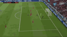a soccer game is being played on a field with hyundai advertisements on the sidelines