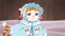 a cartoon cat wearing a blue hat and a blue dress