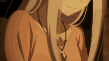 a close up of a woman 's neck with a green pendant on it and a screenshot of a anime showing her breast