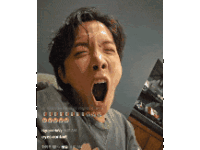 a close up of a person yawning with their mouth wide open