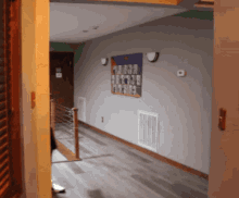 a hallway with a sign on the wall that says ' a '