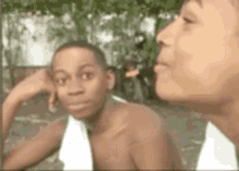 a man and a boy are looking at each other