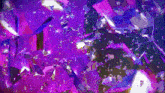 a close up of a purple and blue background with a lot of sparkles