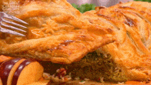 a close up of a piece of food with the words the great canadian baking show written on the bottom