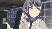 a girl in a suit and tie is holding a piece of paper