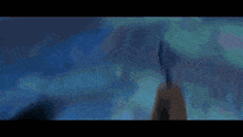 a pixel art of a person standing on a rock