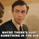 maybe there 's just something in the air is written on a picture of a man