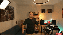 a man in a room with a thinkiules logo on the bottom right
