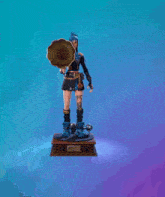 a statue of a woman standing on a record player with a phonograph playing music