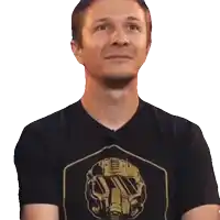 a man wearing a black t-shirt with a robot helmet on it