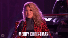 Merry Christmas Tori Kelly GIF - Merry Christmas Tori Kelly Rockefeller Christmas GIFs