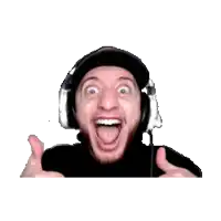 a man wearing headphones and a hat is making a funny face .