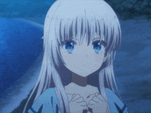a girl with long white hair and blue eyes