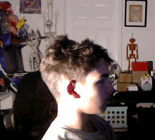 a person 's head is visible in front of a skeleton
