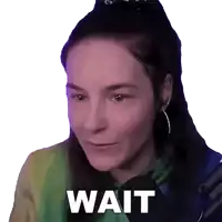 a woman 's face is shown with the word wait written below it
