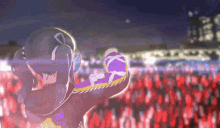 a girl in a purple and yellow outfit stands in front of a crowd of people