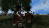a man in a kilt stands next to a man in a red uniform