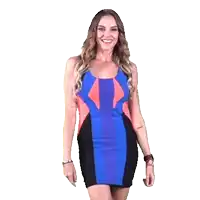 a woman in a blue and pink dress is standing in front of a fox deportes sign