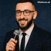 a man in a suit and tie holding a microphone with pixverse.ai written in the corner