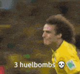 a man in a yellow shirt with the words 3 huelbombs on the bottom