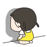 a girl in a yellow dress is kneeling down and covering her face