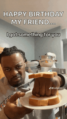 a man is holding a plate with a slice of bread on it and says happy birthday my friend