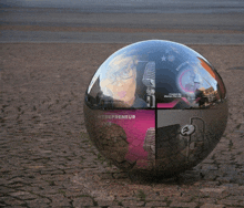 a ball with a reflection of a woman and the word entrepreneur on it