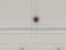 a cartoon character is being destroyed by a brick wall