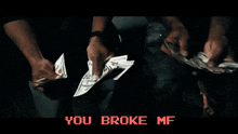 a video of a man counting money with the words " you broke me " in red