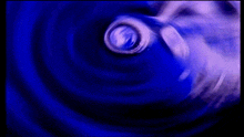 a purple and blue swirl with the number 6 in the middle