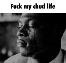a black and white photo of a man crying with the words fuck my chud life below him