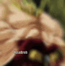 a blurry picture of a person with the words issabreh in the corner