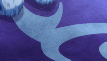a purple and blue carpet with a white swirl on it