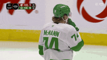 a hockey player with the name mcmann on the back of their jersey