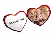 a red heart with a picture of a girl and the word aeresa canon on it