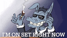 a cartoon donkey smoking a cigar and talking on a cell phone with the words i 'm on set right now below him