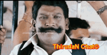 a man with a mustache and the words thiruda chat on the bottom right