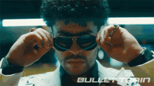 Removing Sunglasses Wolf GIF - Removing Sunglasses Wolf Bullet Train GIFs